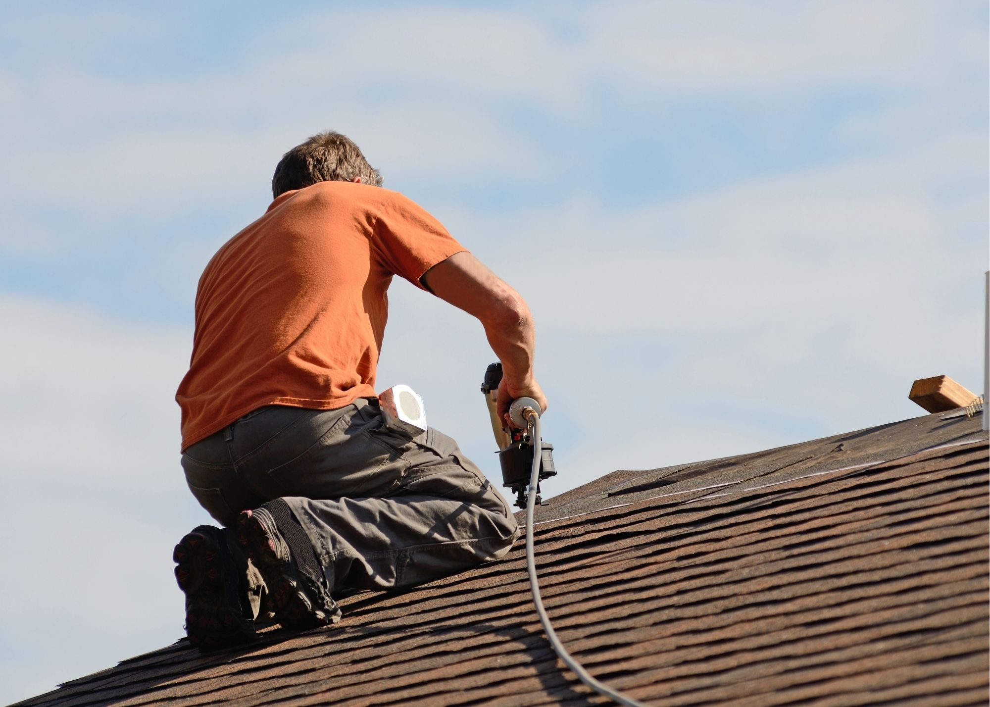 Roofing professional inspecting a Pasadena roof after possible storm damage