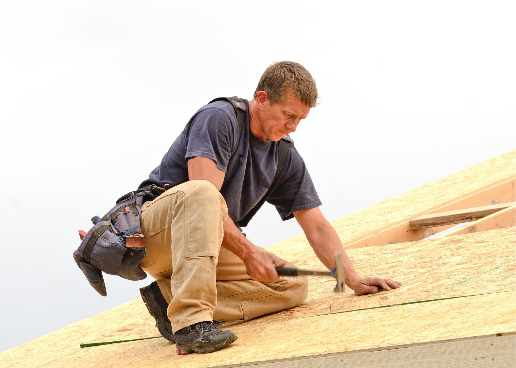 Roof repair contractor working on a roof in Pasadena CA